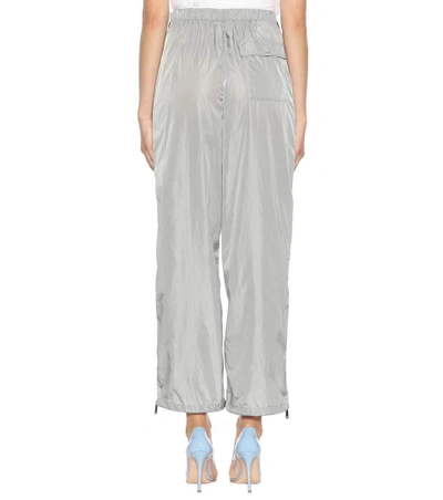 Shop Prada Technical-fabric Trousers In Grey