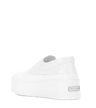 Shop Miu Miu Leather Slip-on Platform Sneakers In White