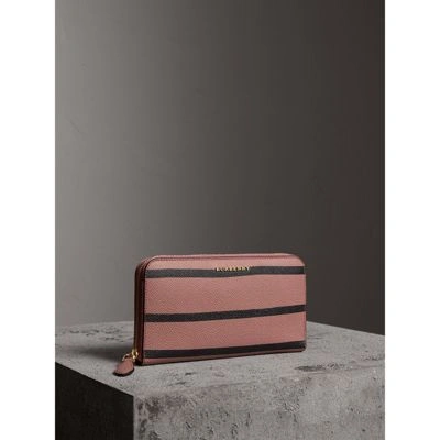 Burberry Trompe L'oeil Print Leather Ziparound Wallet In Dusty Pink