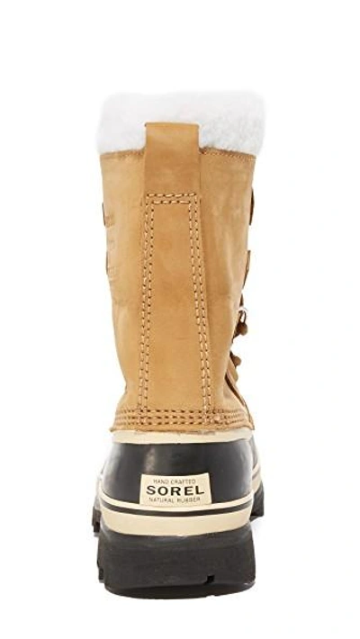 Shop Sorel Caribou Boots In Buff