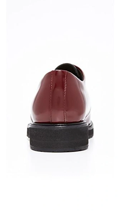 Shop Want Les Essentiels De La Vie Menara Wedge Derby Oxfords In Bordeaux/black