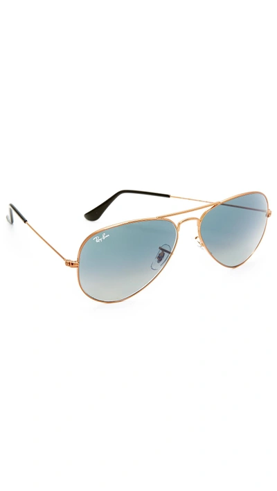 Shop Ray Ban Aviator Sunglasses In Bronze/grey