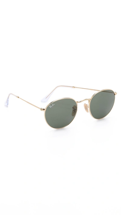 Shop Ray Ban Round Metal Sunglasses In Gold/green