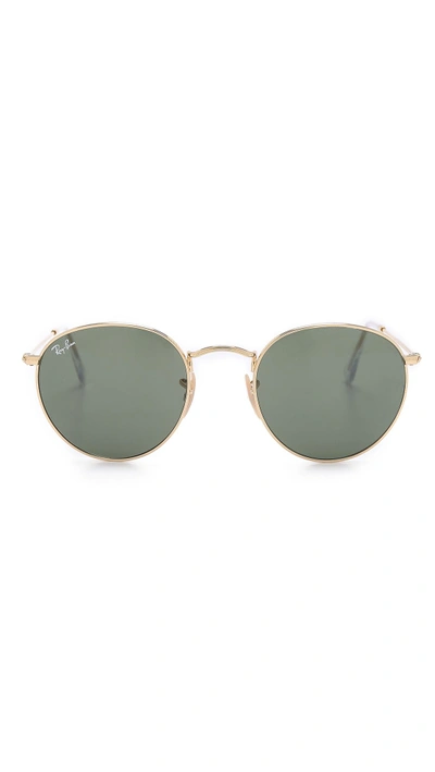 Shop Ray Ban Round Metal Sunglasses In Gold/green