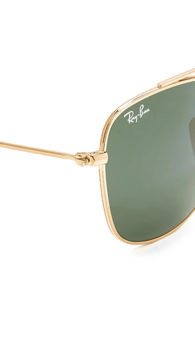 Shop Ray Ban Rounded Caravan Sunglasses In Shiny Gold/green