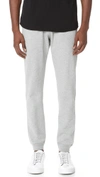 REIGNING CHAMP MIDWEIGHT TERRY SLIM SWEATPANTS,REIGN30209