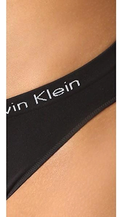 Shop Calvin Klein Underwear Pure Seamless Bikini Panties In Black