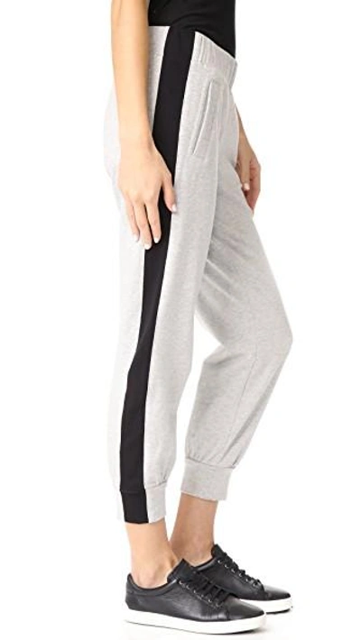 Shop Norma Kamali Side Stripe Jogger Pants In Heather Grey/black