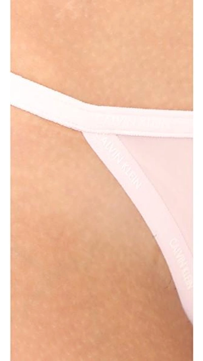 Shop Calvin Klein Underwear Sheer Marq String Thong In Nymph's Thigh