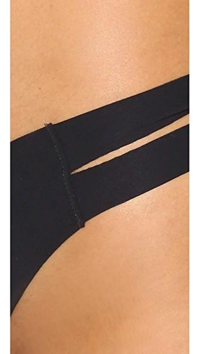Shop Commando The Stripped Thong In Black