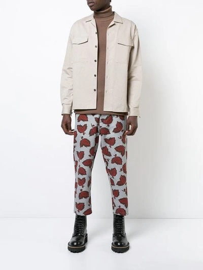 Shop Oamc Patterned Trousers In White