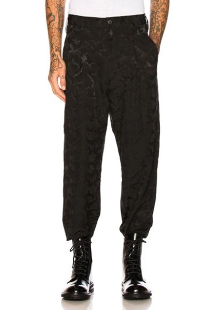 Shop Yohji Yamamoto Camouflage Slim Trousers In Black