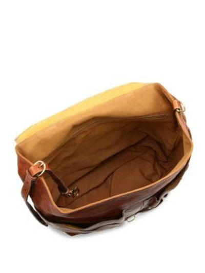 Shop Il Bisonte Buckle-strap Backpack In Brown