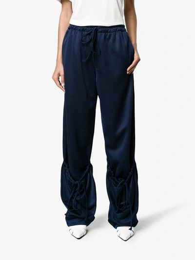 Shop Jw Anderson Pocket Front High-rise Track Pants In Blue