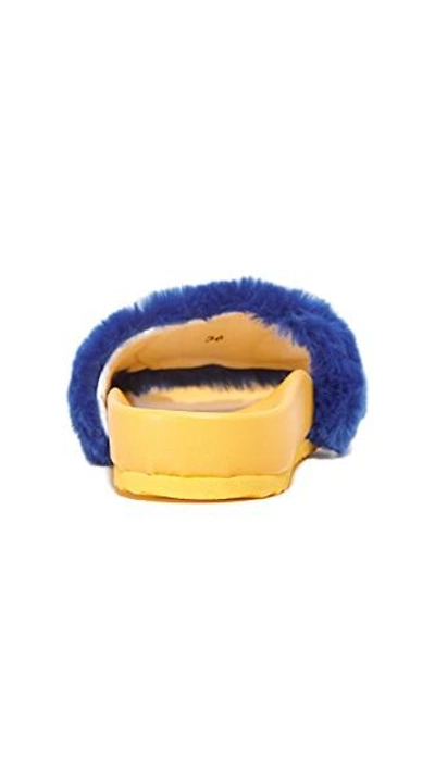 Shop Mira Mikati Raccoon Patch Slides In Blue