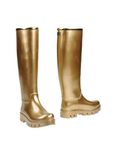 Shop Dolce & Gabbana Boots In Gold