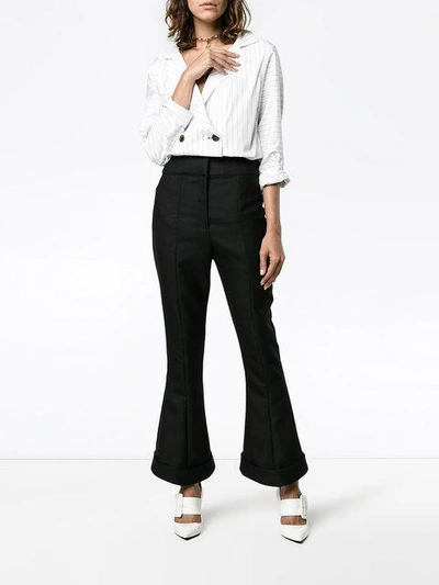 Shop Jacquemus Le Pantalon Nino Trousers In Black