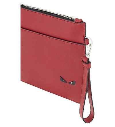 Shop Fendi Micro Monster Leather Pouch In Red
