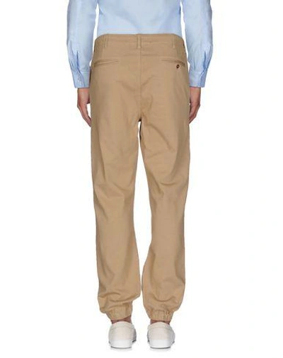 Shop Nlst Casual Pants In Sand