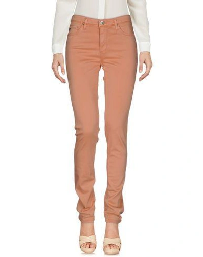 Shop Ag Casual Pants In Salmon Pink