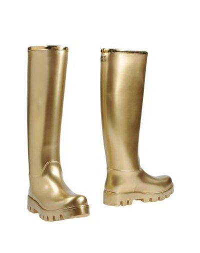 Shop Dolce & Gabbana Boots In Gold
