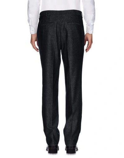 Shop Versace Casual Pants In Black