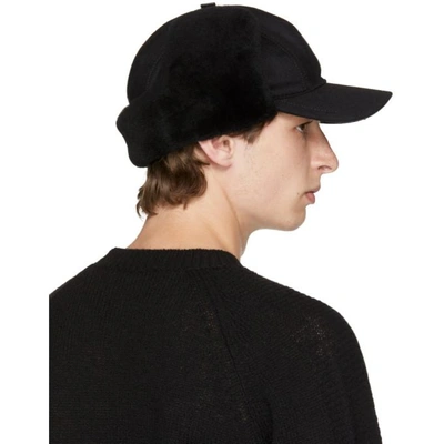 Shop Prada Black Fur Flap Cap In F0002nero