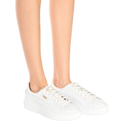 Shop Puma Basket Platform Leather Sneakers In White