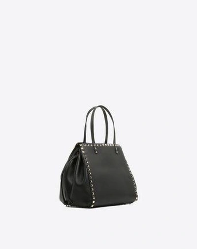 Shop Valentino Rockstud Double Handle Bag In Black