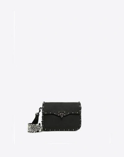 Shop Valentino Rockstud Bag In Black