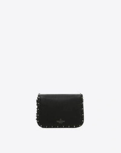 Shop Valentino Rockstud Bag In Black