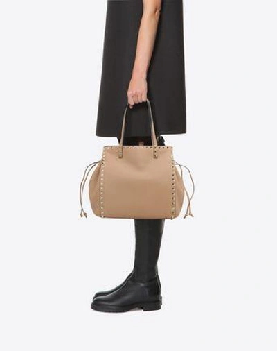 Shop Valentino Rockstud Double Handle Bag In Skin Color
