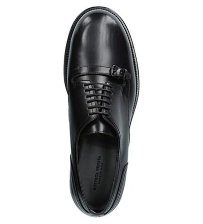 Shop Bottega Veneta Show Strap-detail Leather Derby Shoes In Black