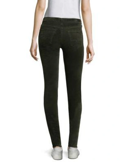 Shop Ag Velvet Skinny Trousers In Climbing Ivy