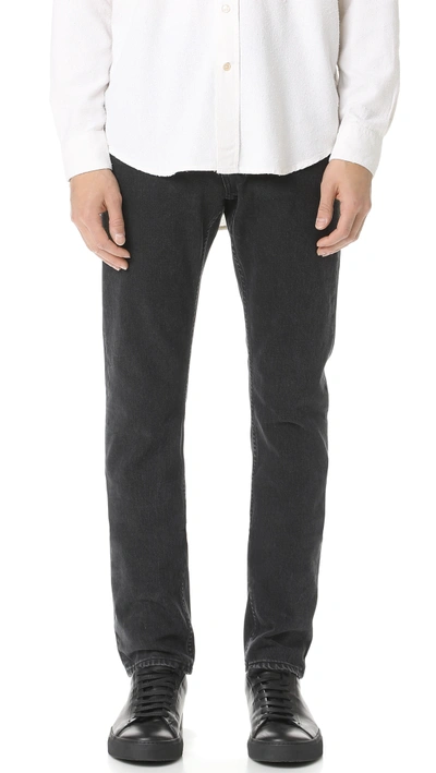 Our Legacy First Cut Washed Jeans In Black