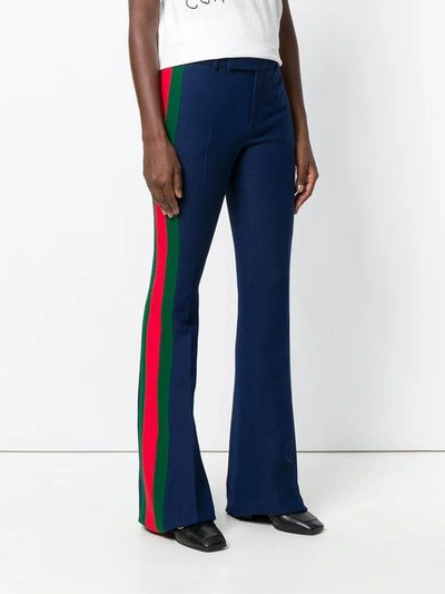 Shop Gucci High-waisted Flared Trousers