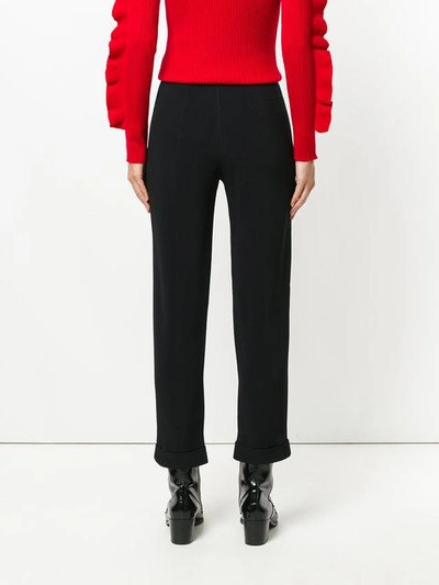 Shop Balmain Crepe Carrot Trousers In Black