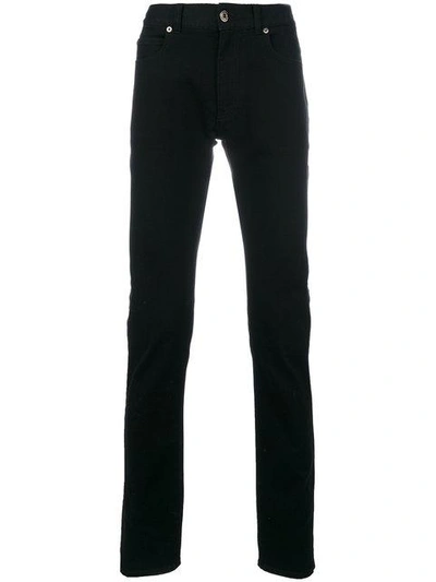 Shop Versace Slim Fit Jeans - Black
