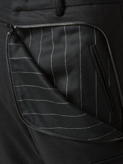 Shop Juunj Pinstripe Panel Trousers In Black