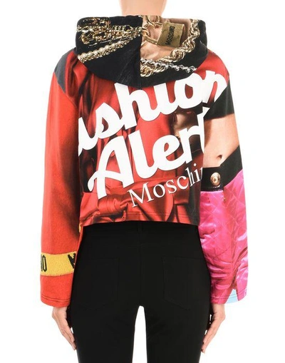 Shop Moschino Hooded Sweatshirts In Red