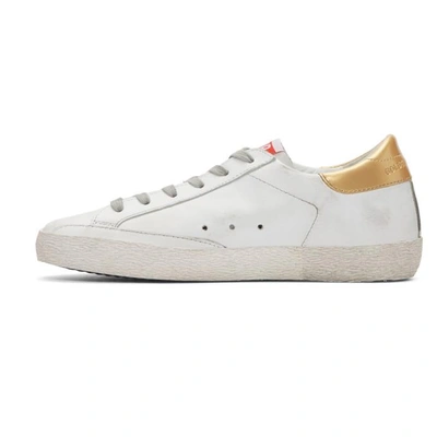 Shop Golden Goose White & Gold Superstar Sneakers