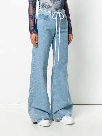 Shop Off-white Flared Drawstring Jeans In Blue