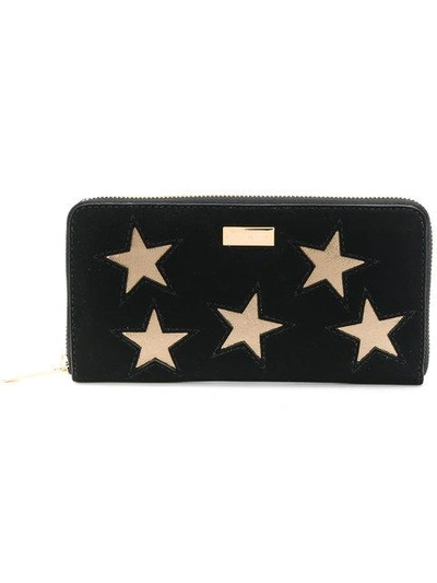 Shop Stella Mccartney Star Patch Continental Purse - Black