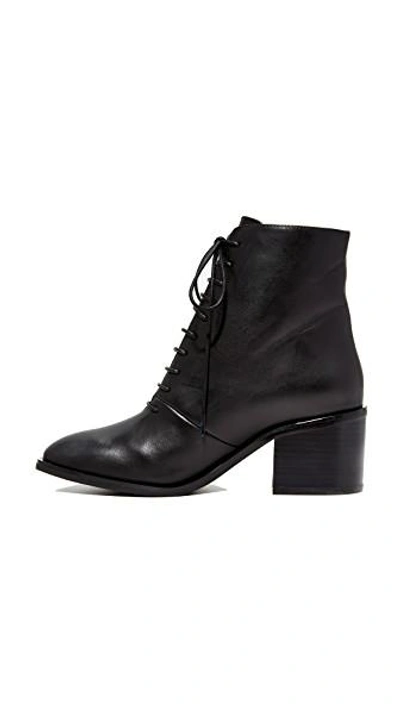 Shop Jeffrey Campbell Talcott Stacked Heel Lace-up Booties In Black
