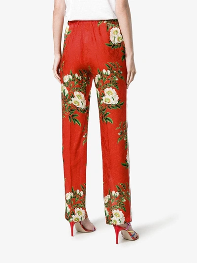 Shop Gucci Silk Floral Print Pyjama Trousers In Red