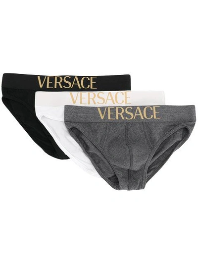 Shop Versace Pack Of Three Logo Waistband Briefs In Black