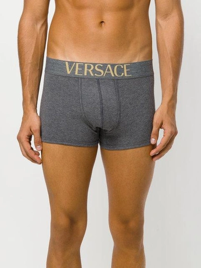 Shop Versace Pack Of Three Logo Waistband Boxer Shorts In Black