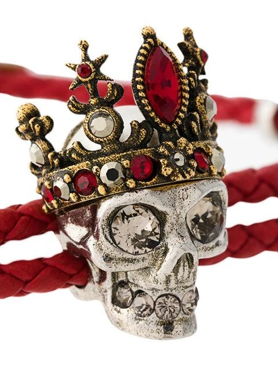 Shop Alexander Mcqueen Skull Braided Bracelet In Red