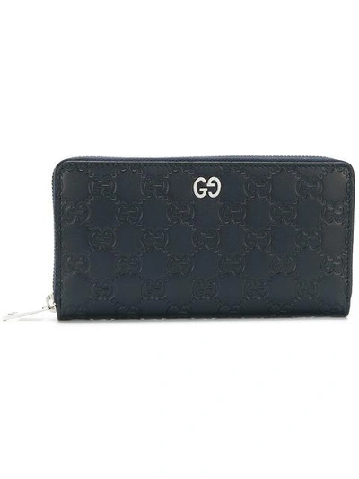 Shop Gucci Signature Zip Around Wallet In Black