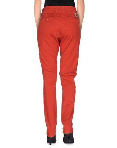 Shop Carhartt Casual Pants In Red